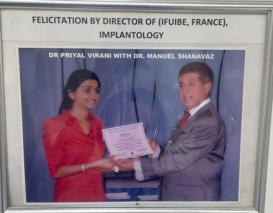 Dr. Priyal Virani felicitated by the Director of IFUIBE, France